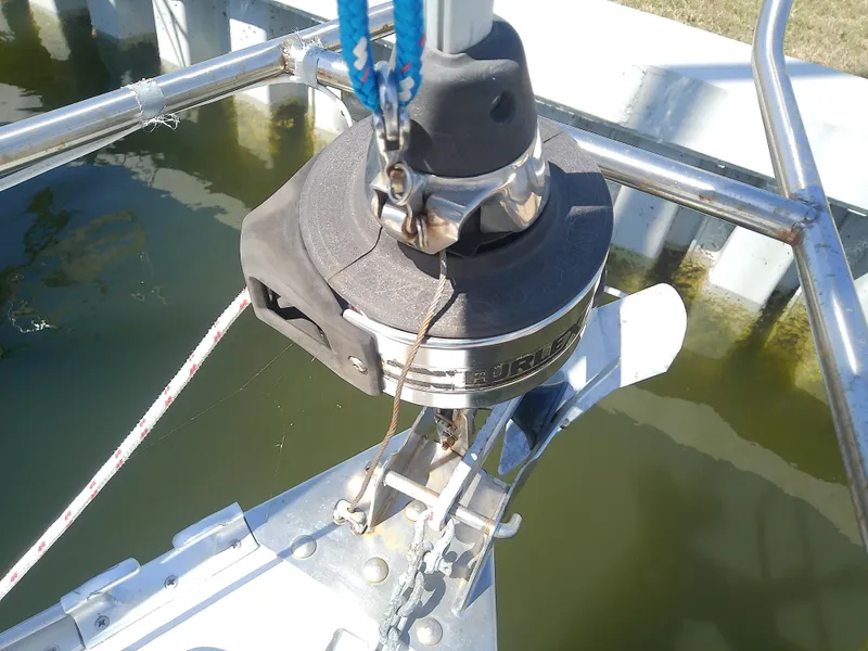 Slide: The Image of Bavaria 37 Cruiser 2001 sailboat anchor system, docked in calm waters. - 10