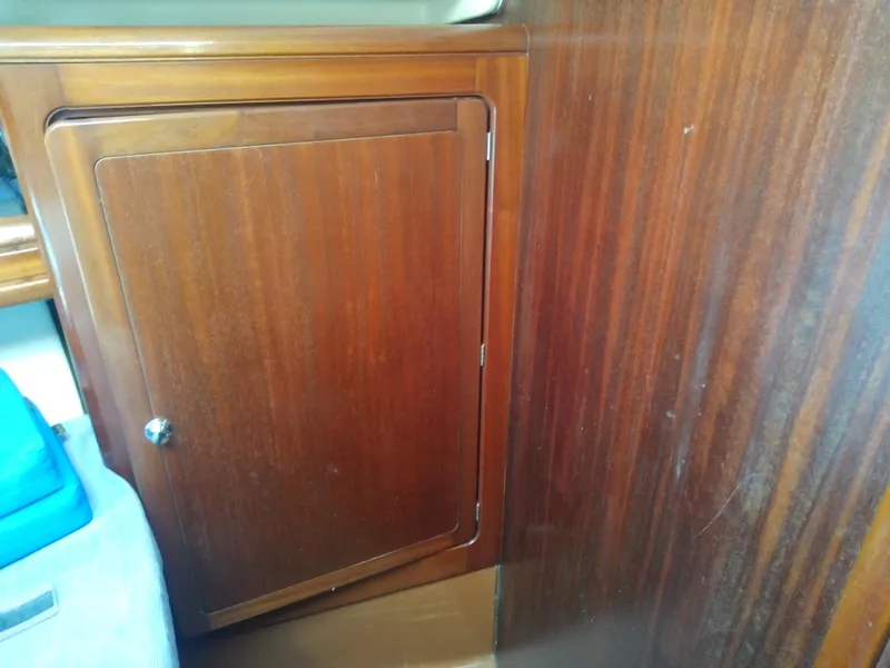 Slide: The Image of Wooden cabinet door inside 2001 Bavaria 37 Cruiser yacht interior. - 43