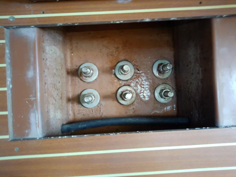 Slide: The Image of Bavaria 37 Cruiser 2001 keel bolts in wooden compartment. - 47
