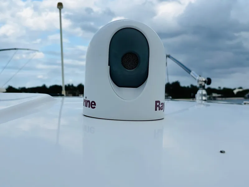 Slide: The Image of Raymarine equipment on 2016 Boston Whaler 370 Outrage under cloudy sky. - 13