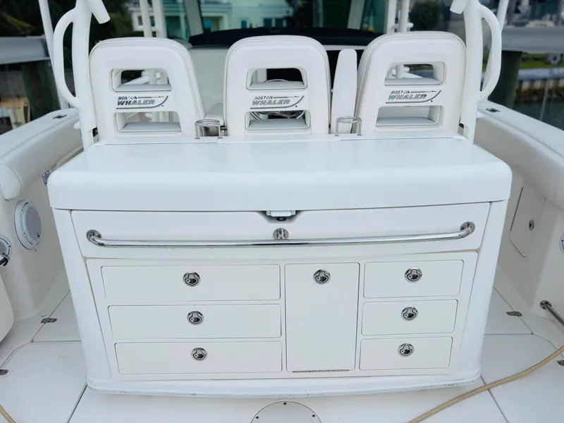 Slide: The Image of 2016 Boston Whaler 370 Outrage boat seating and storage area. - 28