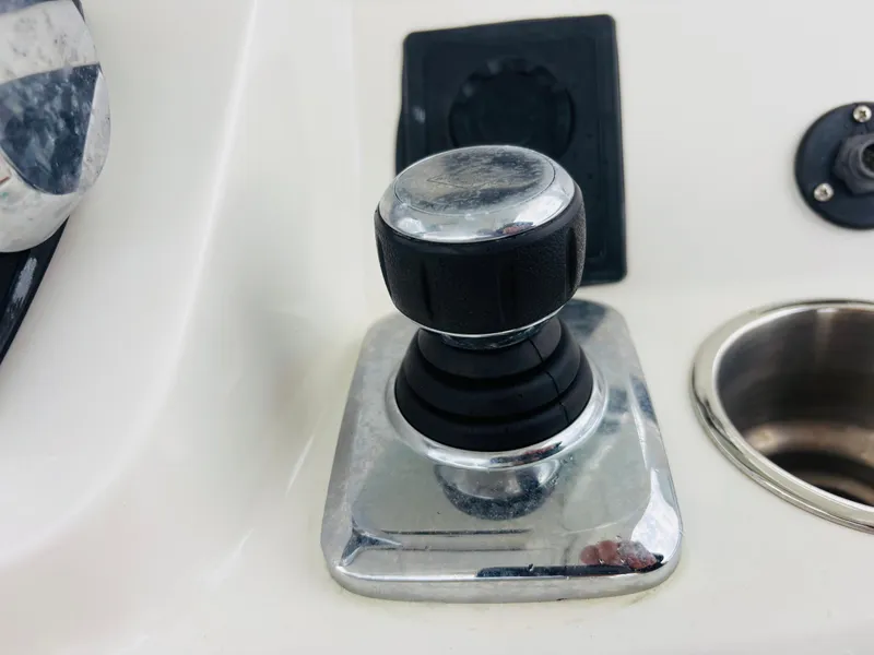 Slide: The Image of Close-up of a 2016 Boston Whaler 370 Outrage boat control knob. - 32