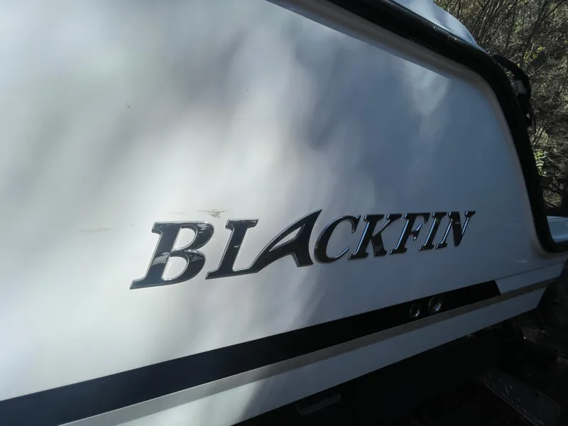 Slide: The Image of 2019 Blackfin 212 CC boat with logo on the side. - 19