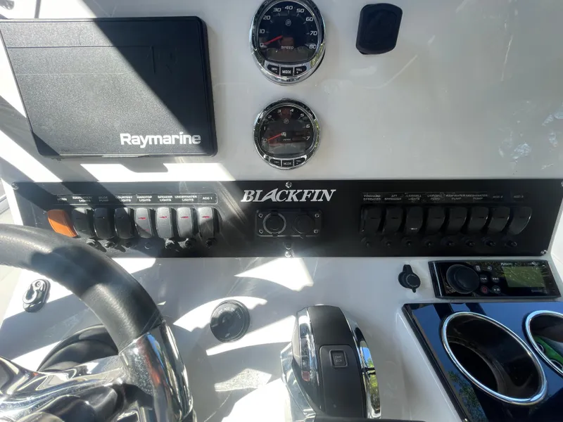 Slide: The Image of Control panel of 2019 Blackfin 212 CC boat with Raymarine equipment and gauges. - 3