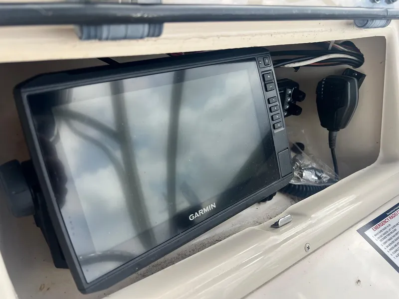 Slide: The Image of Garmin navigation system in a 2007 Grady-White Adventure 208 boat console. - 6