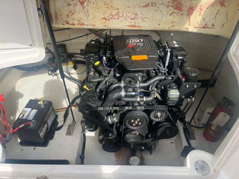 Slide: The Image of Engine compartment of a 2004 Chaparral Sunesta 254 boat with MerCruiser 350 MAG MPI engine. - 16