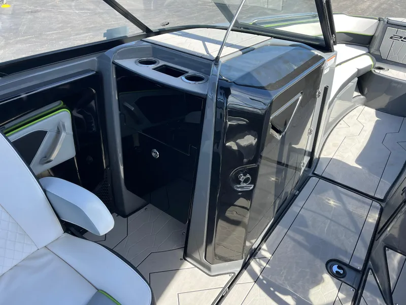 Slide: The Image of Interior of 2021 Yamaha Boats 255X, featuring sleek seating and modern design elements. - 12