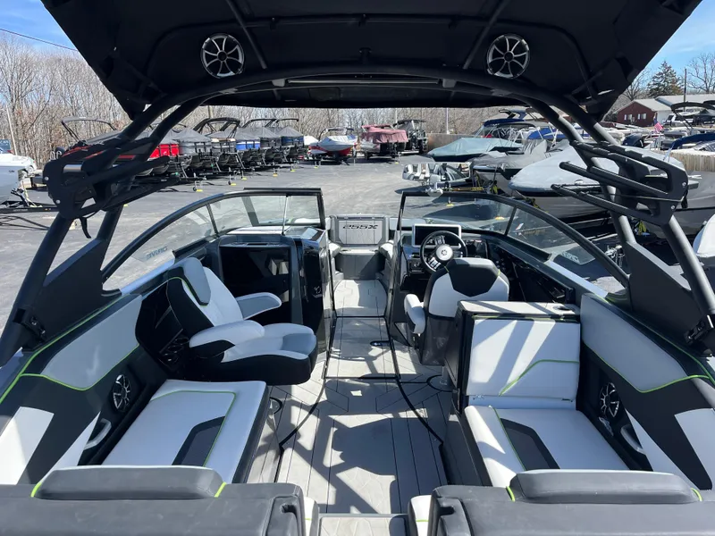 Slide: The Image of 2021 Yamaha Boats 255X interior with modern seating and sleek design. - 6