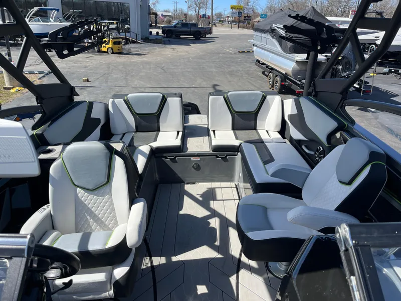 Slide: The Image of 2021 Yamaha Boats 255X interior with modern seating and sleek design. - 7