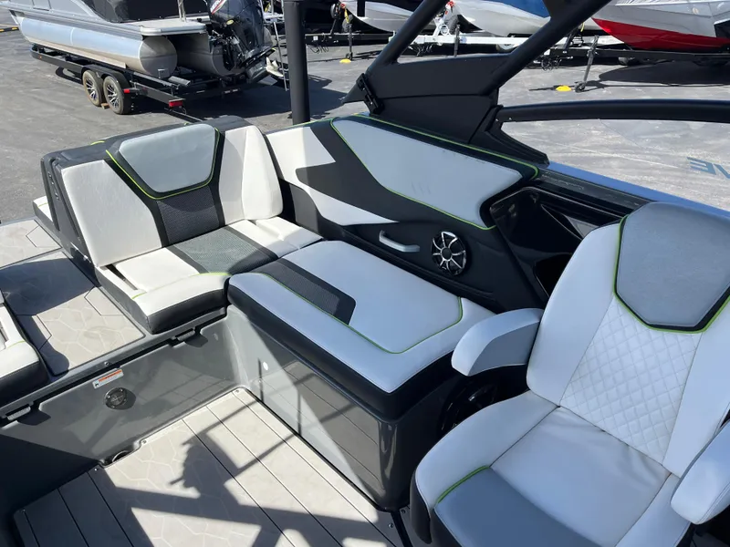 Slide: The Image of 2021 Yamaha Boats 255X interior with stylish seating and modern design. - 8