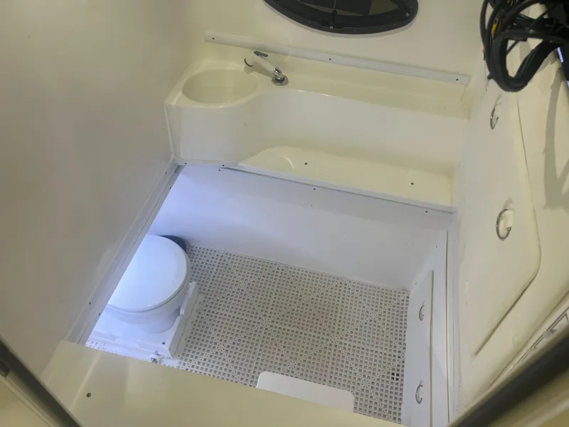 Slide: The Image of 2022 Contender 39 ST boat with rod holders and sleek design. - 12