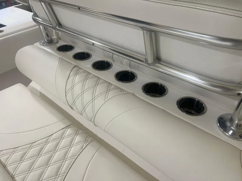 Slide: The Image of 2022 Contender 39 ST boat control panel with illuminated joystick and buttons. - 17