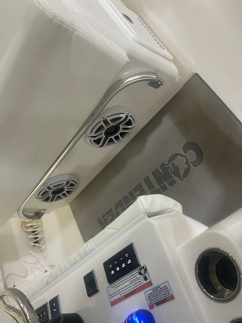 Slide: The Image of Storage compartment of 2022 Contender 39 ST boat with anchor and ropes. - 21