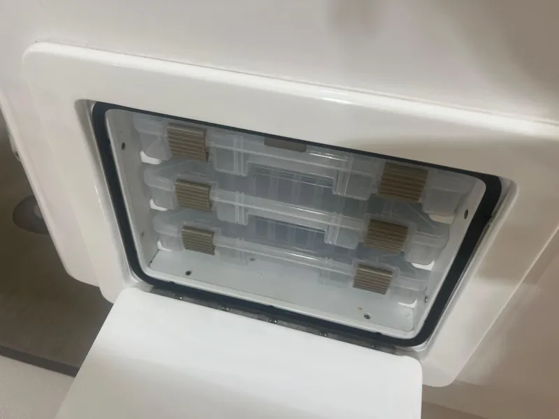 Slide: The Image of 2022 Contender 39 ST boat with Garmin xHD2 radar in a garage. - 22