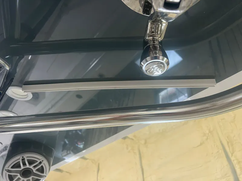 Slide: The Image of Control panel of a 2022 Contender 39 ST boat with warning label. - 26