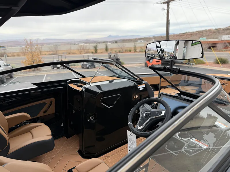 Slide: The Image of Interior view of 2025 Yamaha Boats 255XD, featuring sleek design and modern controls. - 27