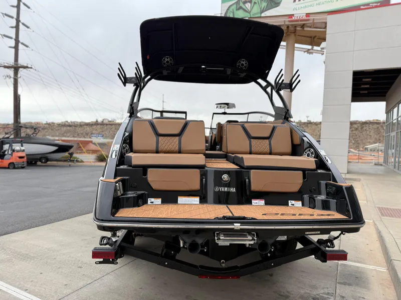 Slide: The Image of 2025 Yamaha Boats 255XD, rear view, showcasing luxurious seating and sleek design. - 5