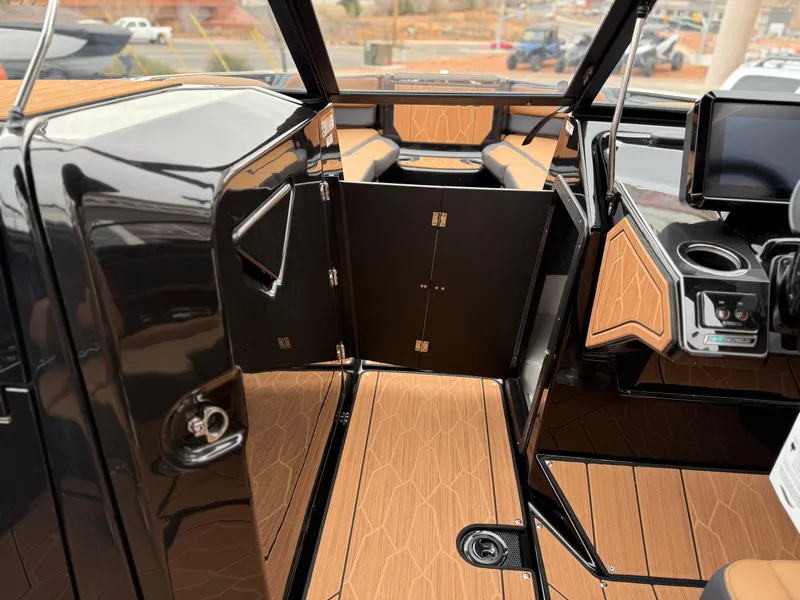 Slide: The Image of Interior view of 2025 Yamaha Boats 255XD, featuring sleek design and modern amenities. - 59
