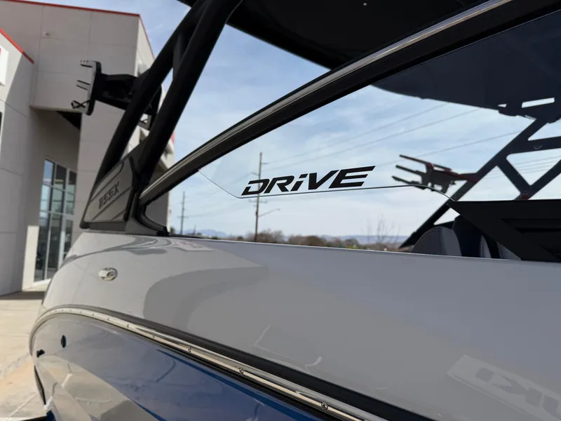 Slide: The Image of 2025 Yamaha Boats 255XD, close-up of sleek design and "Drive" logo. - 15