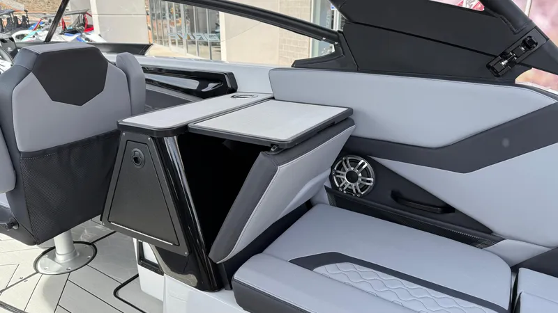 Slide: The Image of 2025 Yamaha Boats 255XD interior with sleek seating and modern design features. - 36