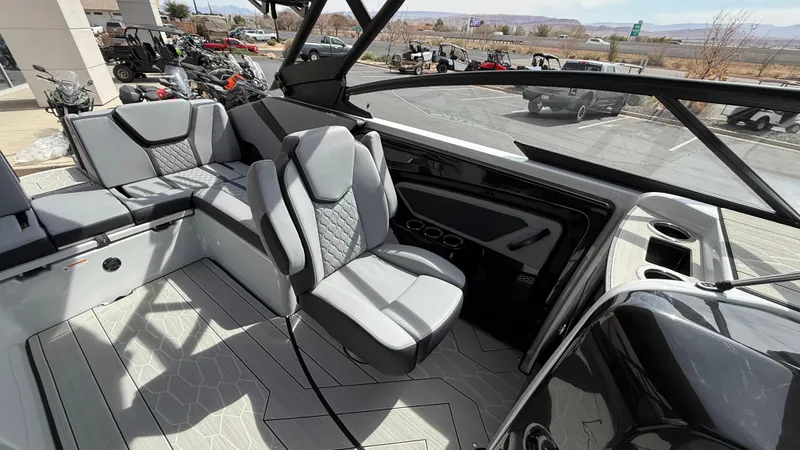 Slide: The Image of 2025 Yamaha Boats 255XD interior with modern seating and sleek design. - 39