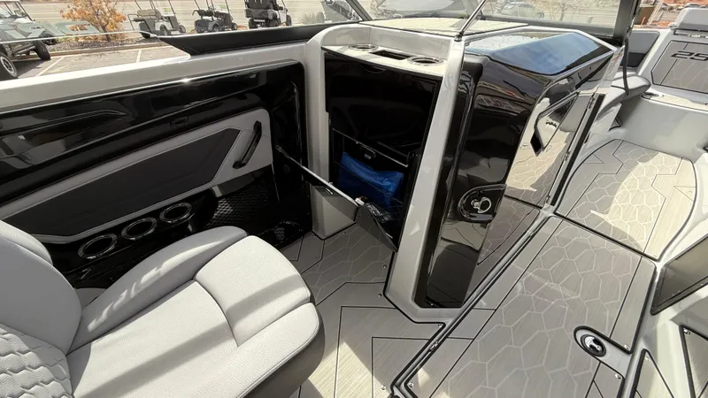 Slide: The Image of 2025 Yamaha Boats 255XD interior with sleek seating and modern design features. - 42