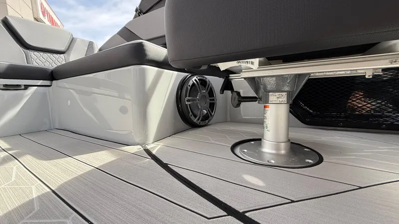 Slide: The Image of 2025 Yamaha Boats 255XD interior with sleek seating and modern flooring design. - 44