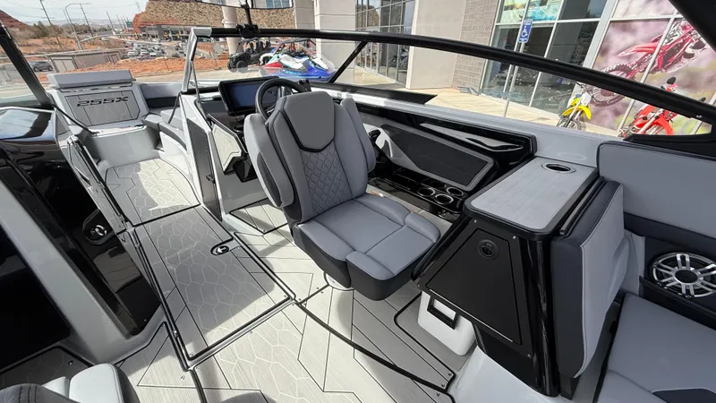 Slide: The Image of 2025 Yamaha Boats 255XD interior with modern seating and sleek design. - 49