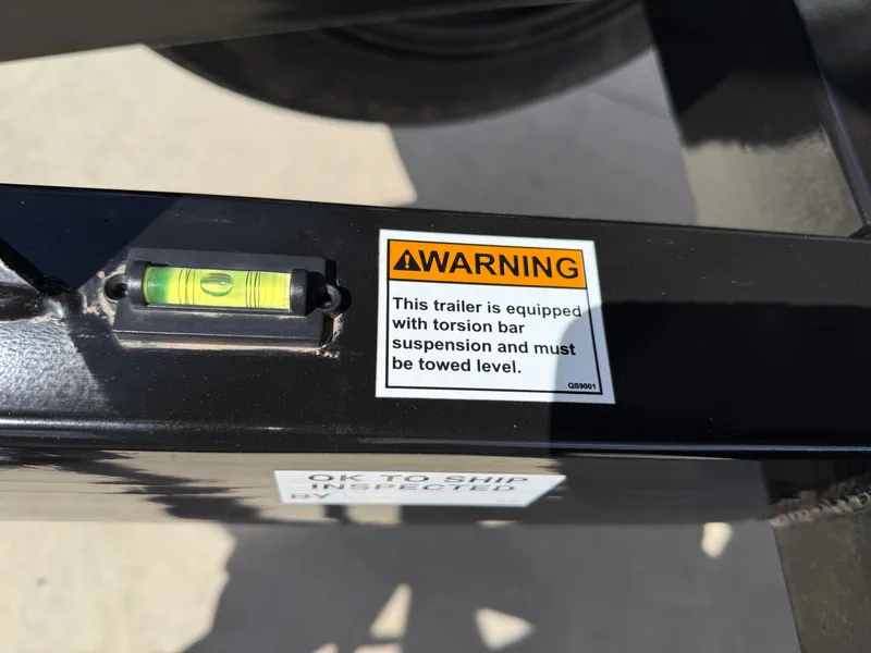 Slide: The Image of Warning label on Yamaha Boats 275 SD trailer with torsion bar suspension, 2025 model. - 15