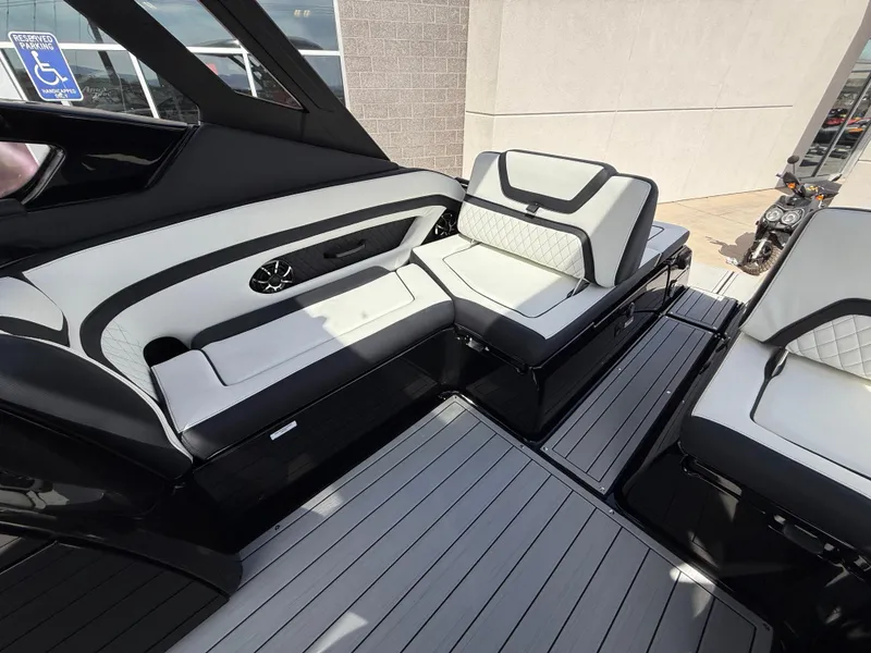 Slide: The Image of 2025 Yamaha Boats 275 SD interior with sleek seating and modern design. - 42