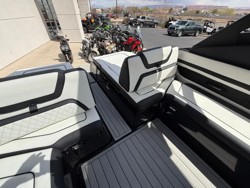 Slide: The Image of 2025 Yamaha Boats 275 SD interior with sleek seating and modern design. - 44