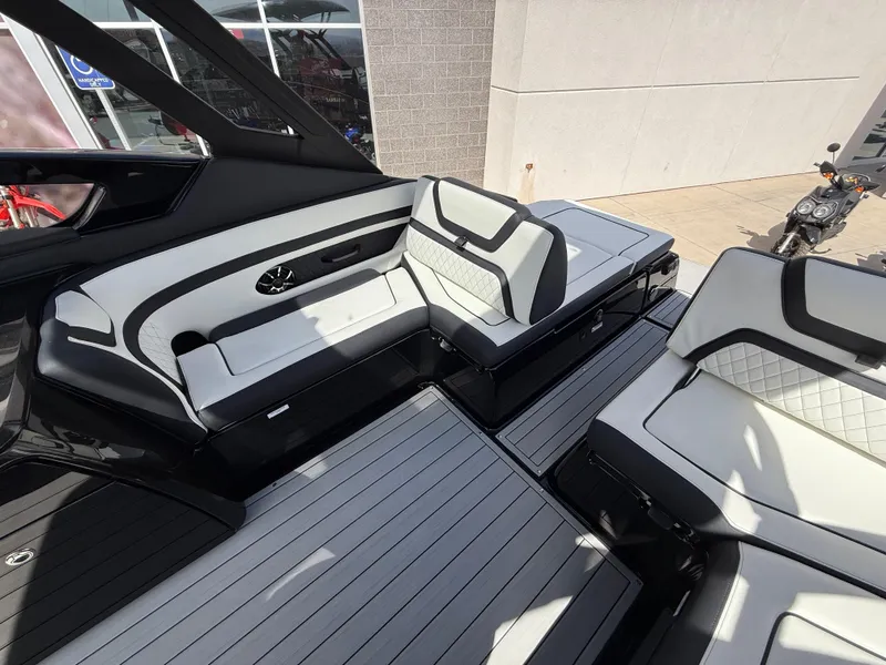Slide: The Image of 2025 Yamaha Boats 275 SD interior with sleek seating and modern design. - 45