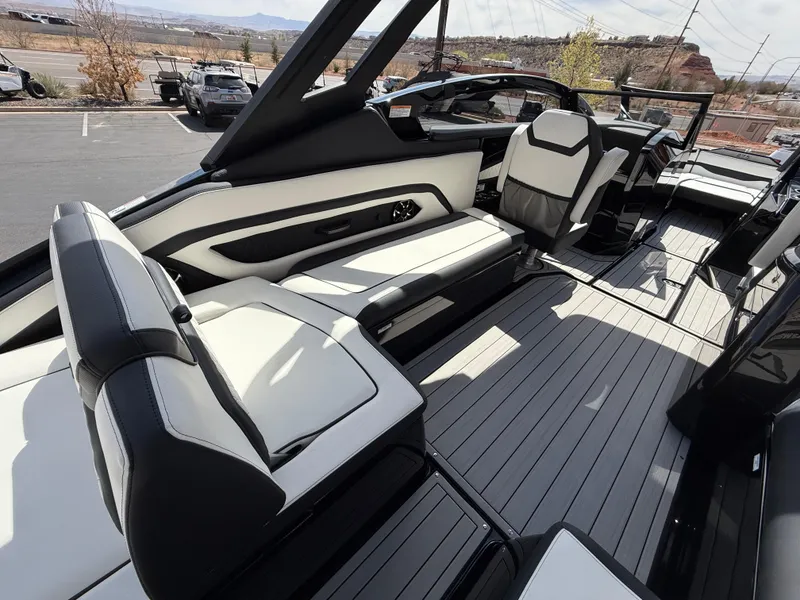 Slide: The Image of 2025 Yamaha Boats 275 SD interior with sleek seating and modern design. - 48
