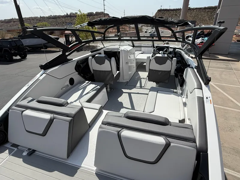 Slide: The Image of 2025 Yamaha Boats AR250 interior with sleek seating and modern design. - 23