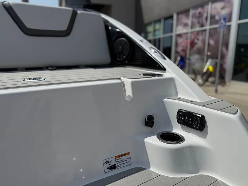 Slide: The Image of 2025 Yamaha AR250 boat interior with seating and control panel, showcasing modern design and functionality. - 30