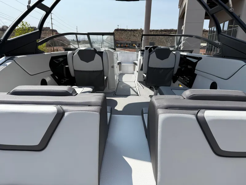 Slide: The Image of 2025 Yamaha Boats AR250 interior with modern seating and sleek design. - 32