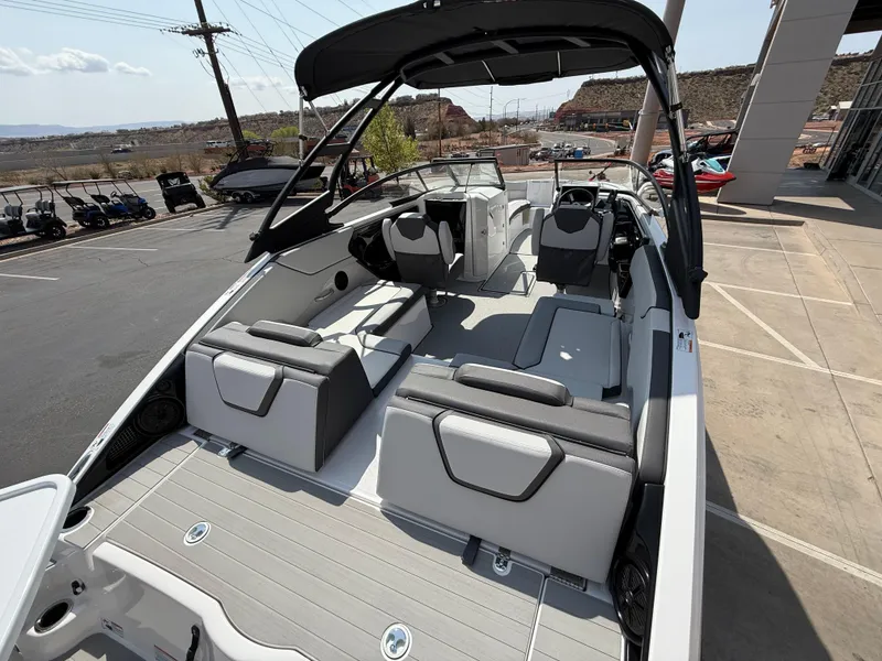 Slide: The Image of 2025 Yamaha Boats AR250 interior with sleek seating and modern design. - 33