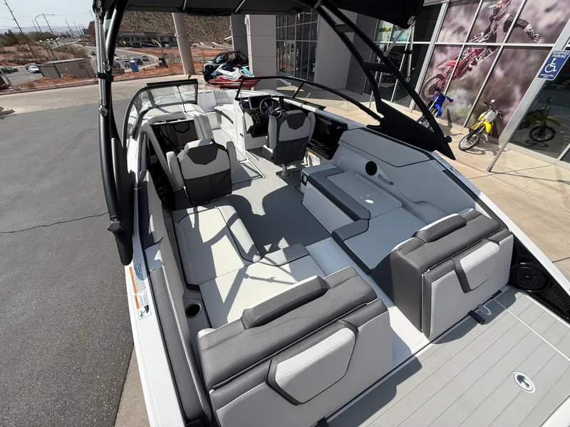 Slide: The Image of 2025 Yamaha Boats AR250 interior with sleek seating and modern design. - 34