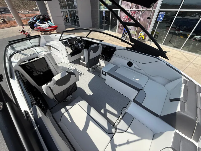 Slide: The Image of 2025 Yamaha Boats AR250 interior with modern seating and sleek design. - 35
