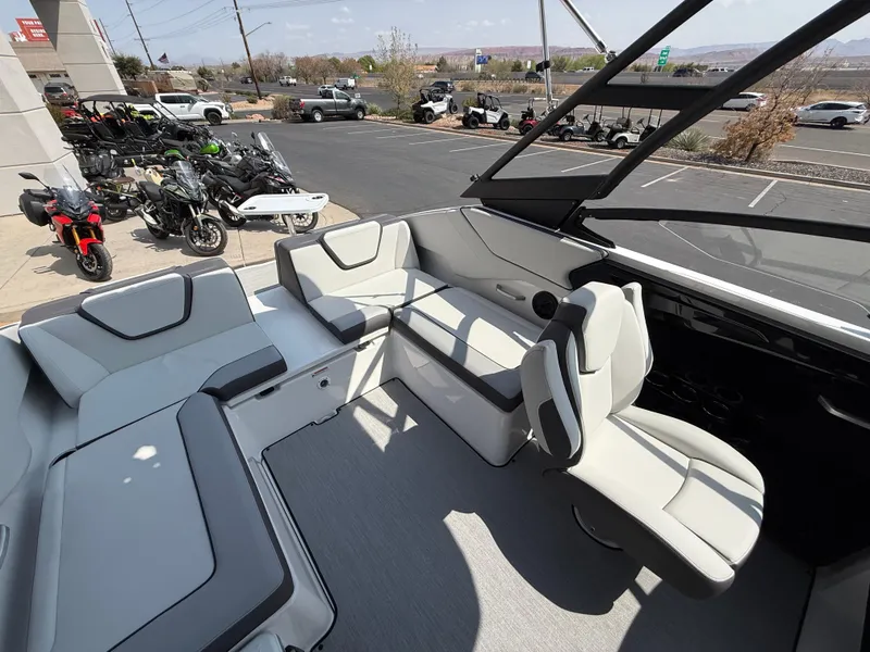 Slide: The Image of 2025 Yamaha Boats AR250 interior with modern seating and sleek design. - 37