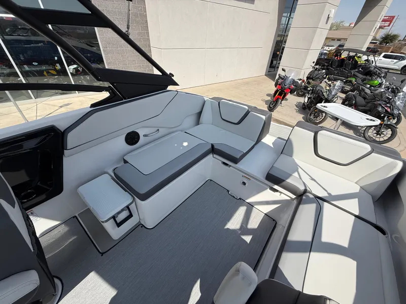 Slide: The Image of 2025 Yamaha Boats AR250 interior with sleek seating and modern design. - 38