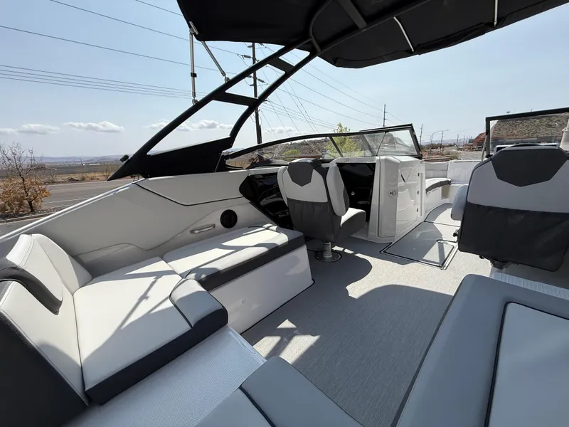 Slide: The Image of 2025 Yamaha Boats AR250 interior with sleek seating and modern design. - 39