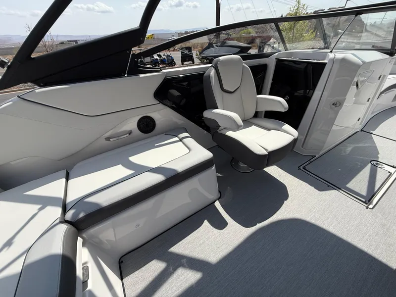 Slide: The Image of 2025 Yamaha Boats AR250 interior with modern seating and sleek design. - 41