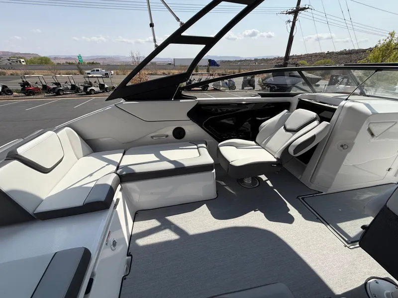 Slide: The Image of 2025 Yamaha Boats AR250 interior with modern seating and sleek design. - 42