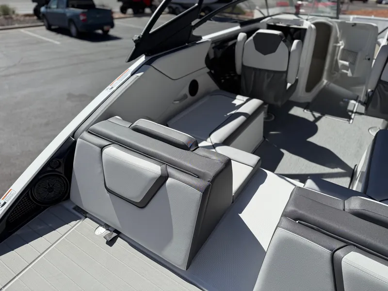 Slide: The Image of 2025 Yamaha Boats AR250 interior with sleek seating and modern design. - 32