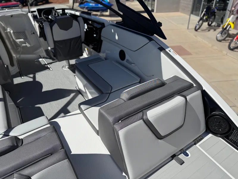 Slide: The Image of 2025 Yamaha Boats AR250 interior with sleek seating and modern design. - 33