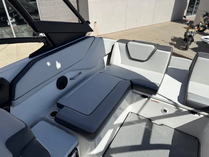 Slide: The Image of 2025 Yamaha Boats AR250 interior seating with modern design and comfortable upholstery. - 34