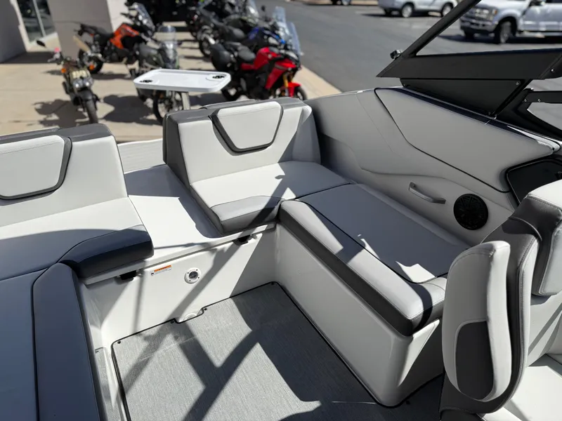 Slide: The Image of 2025 Yamaha Boats AR250 interior with sleek seating and modern design. - 35