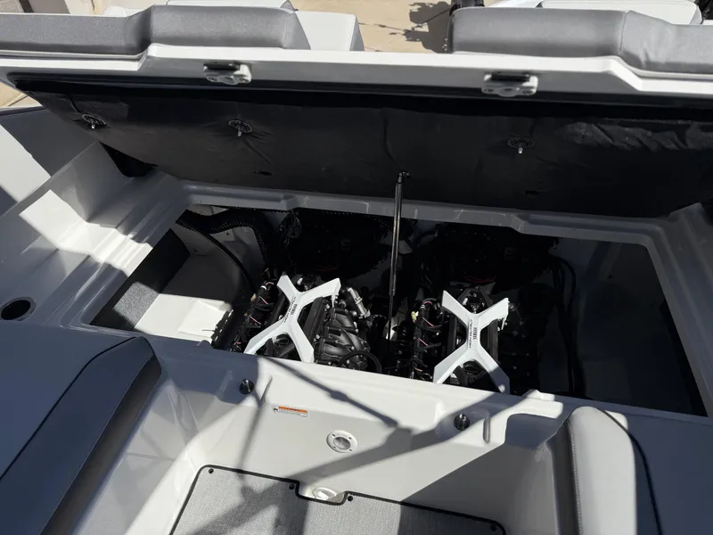 Slide: The Image of 2025 Yamaha Boats AR250 engine compartment with dual engines visible. - 36