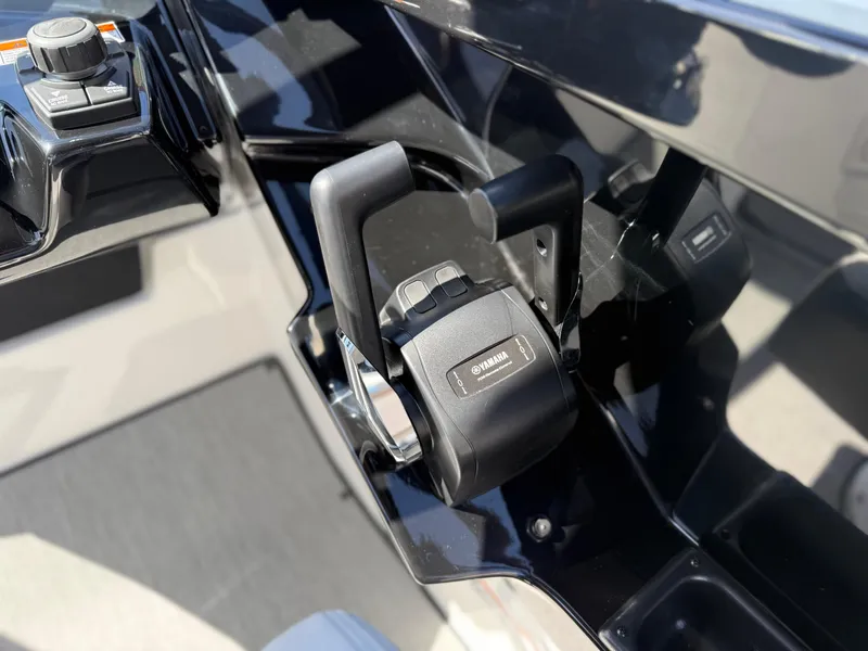Slide: The Image of Close-up of 2025 Yamaha Boats AR250 throttle control. - 43
